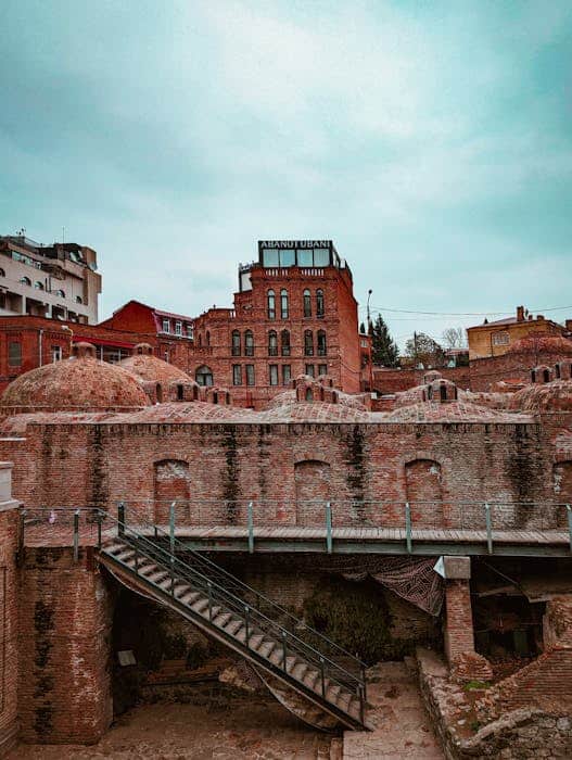 Explore the ancient sulfur bathhouses of the Old Town in Tbilisi, Georgia, featuring iconic brick domes.