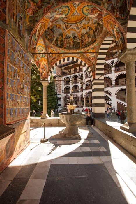 Vibrant frescoes and arches at Rila Monastery, Bulgaria's iconic landmark.